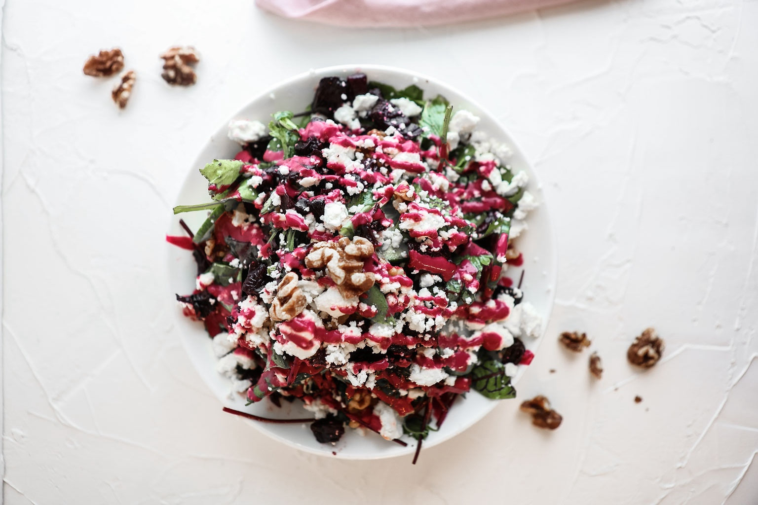 A picture of a delicious looking Greek salad with feta cheese as offered at Juniper Cafe in Kingston, Ontario.
