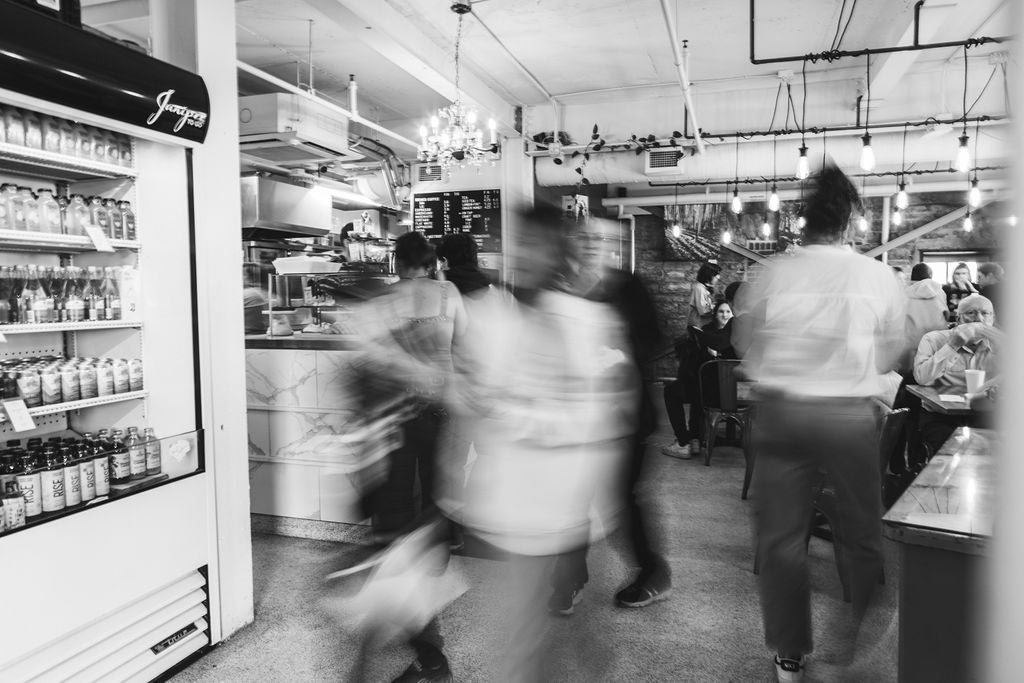 A picture of people moving at the Waterfront location of Juniper Cafe in Kingston