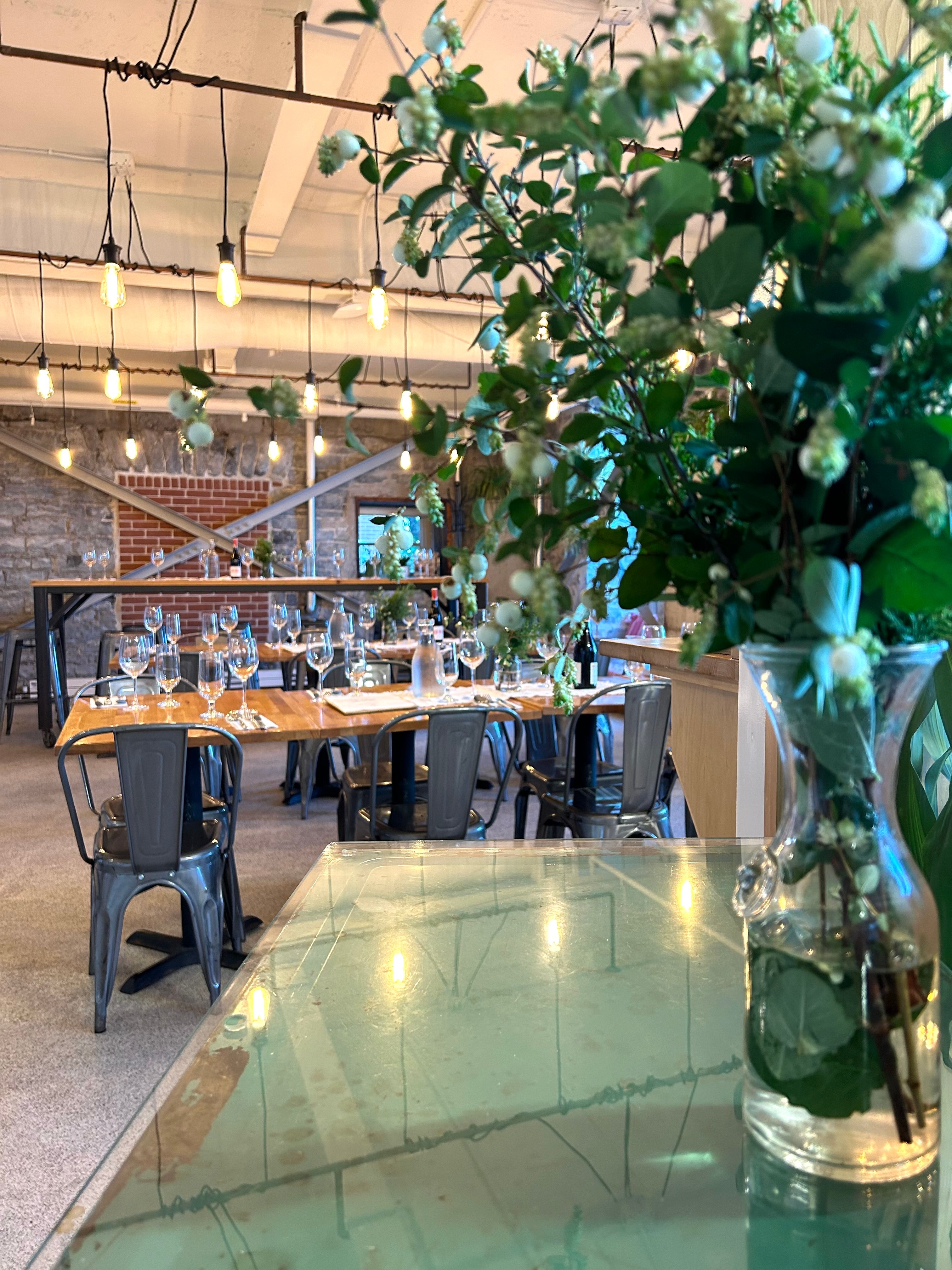 A beautiful picture showing the working spaces at the King St Waterfront Location of Juniper Cafe.